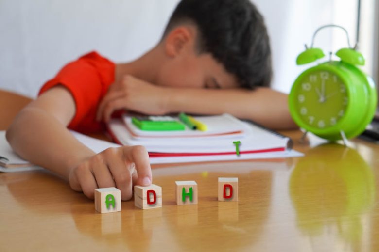 Child at desk with ADHD blocks