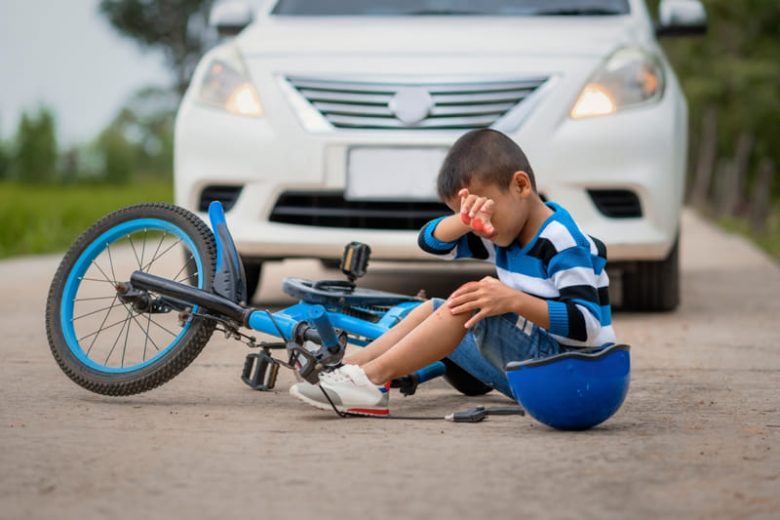 Small child hurt after having an accident on their bike