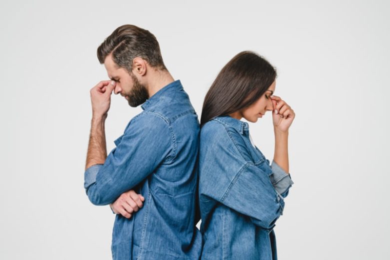 Upset couple facing away from each other