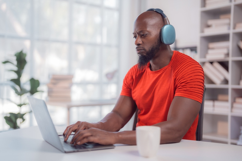 Dad wearing noise cancelling headphones