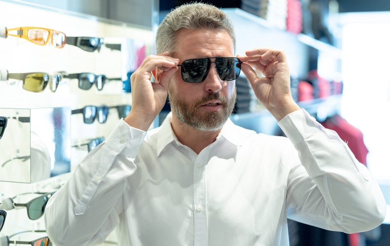 Man Buying Sunglasses
