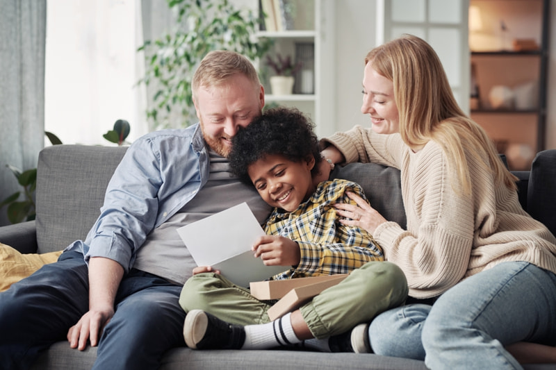 Adopted child reading mail