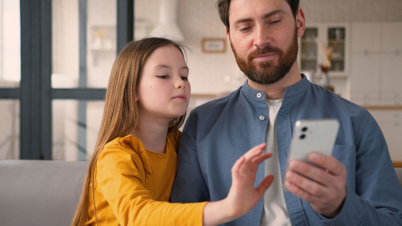 Parent and Child on Phone