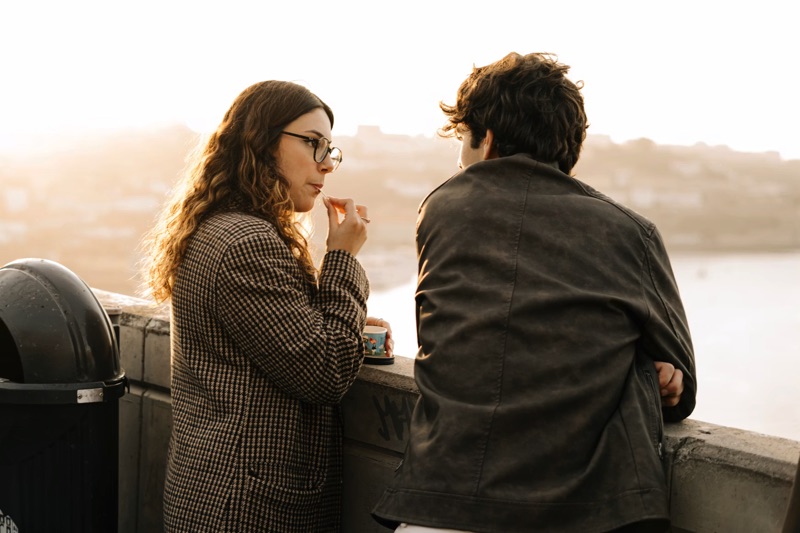 Man talking to woman