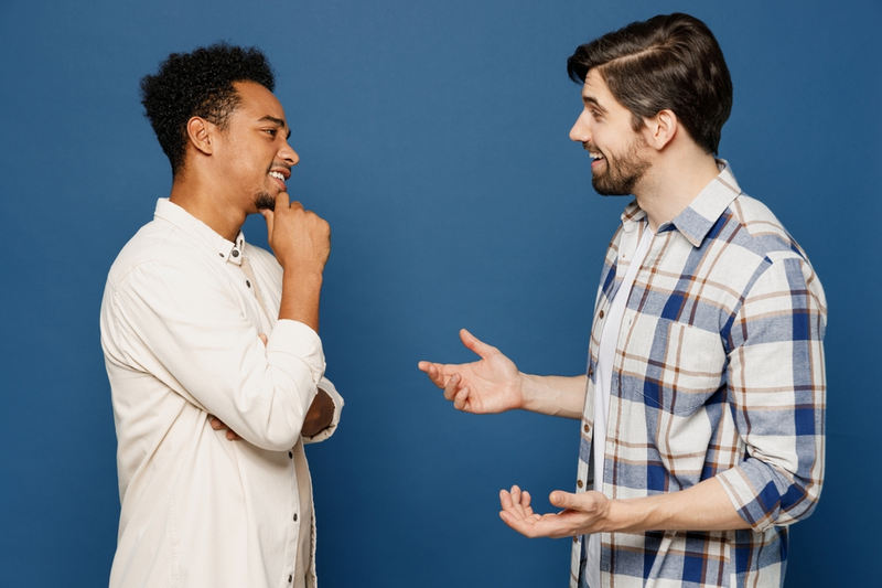 Two men talking