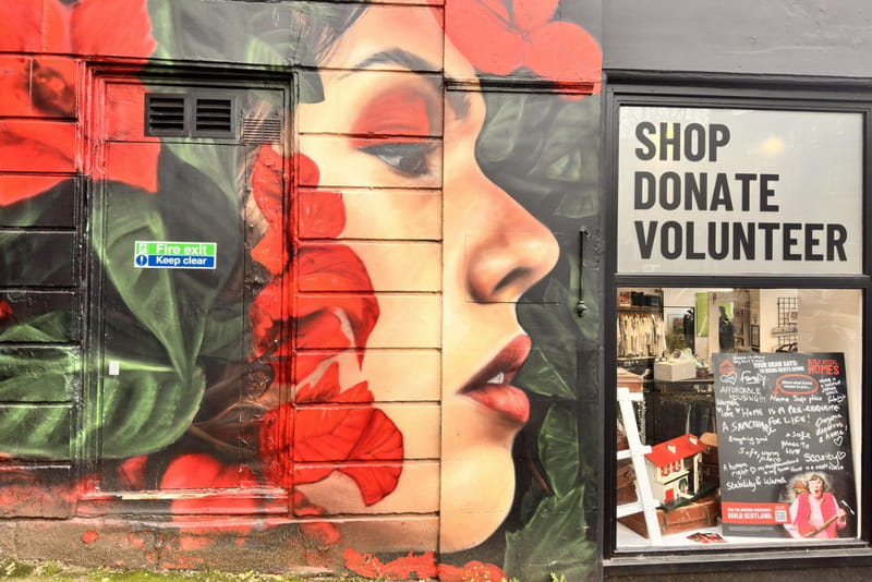 Mural outside a charity shop window